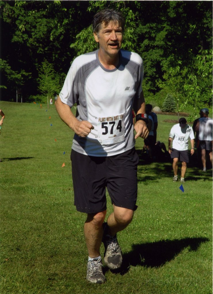 Flirt w Dirt 10K 2008 0215.jpg - Hot and tired coming up the final hill.